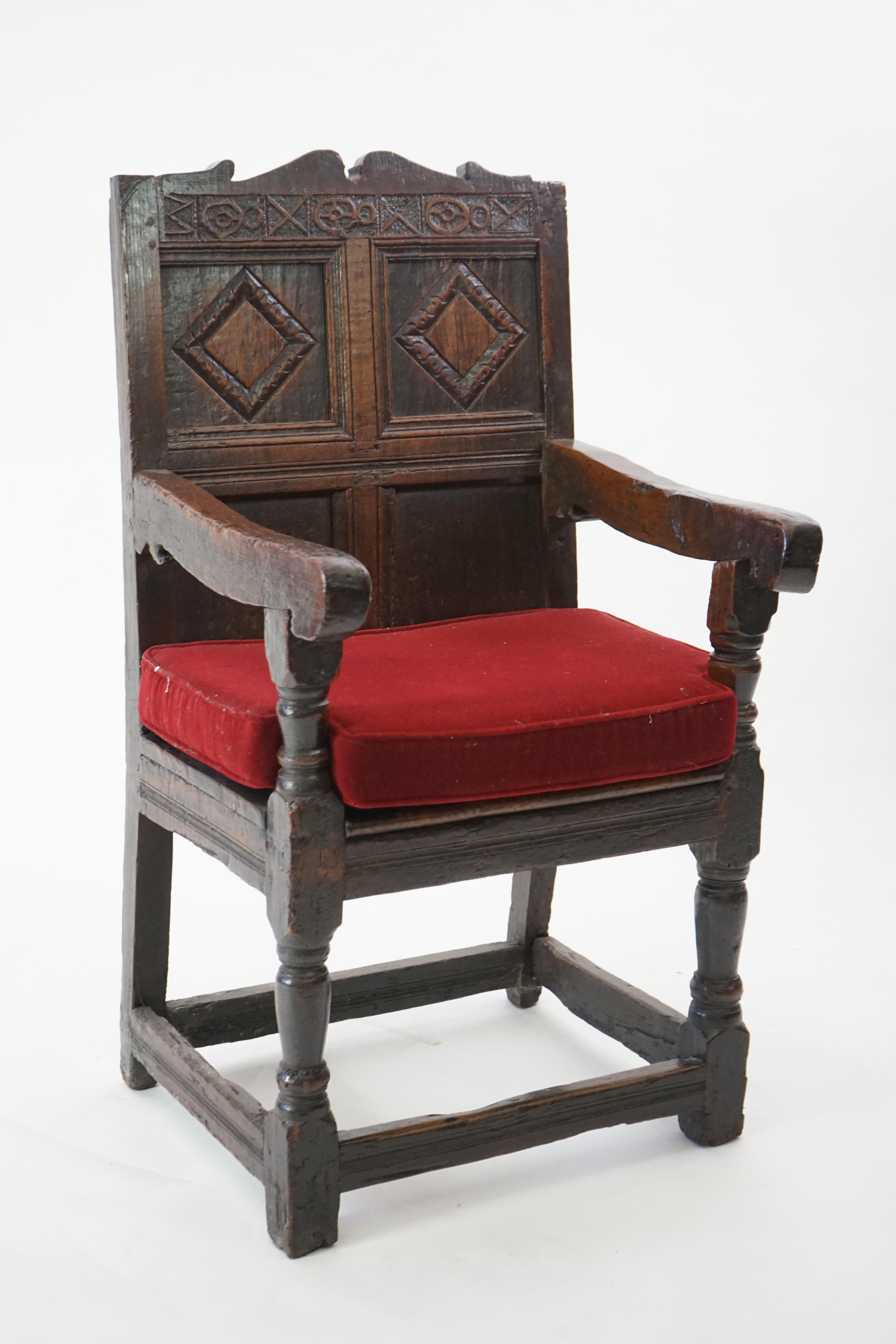 A 17th century and later oak Wainscot elbow chair